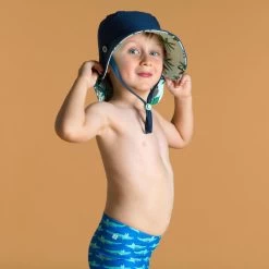 Chapeau Anti UV Bébé Réversible Bleu Et Imprimé Palmiers -Série Surf chapeau anti uv bebe reversible bleu et imprime palmiers 2